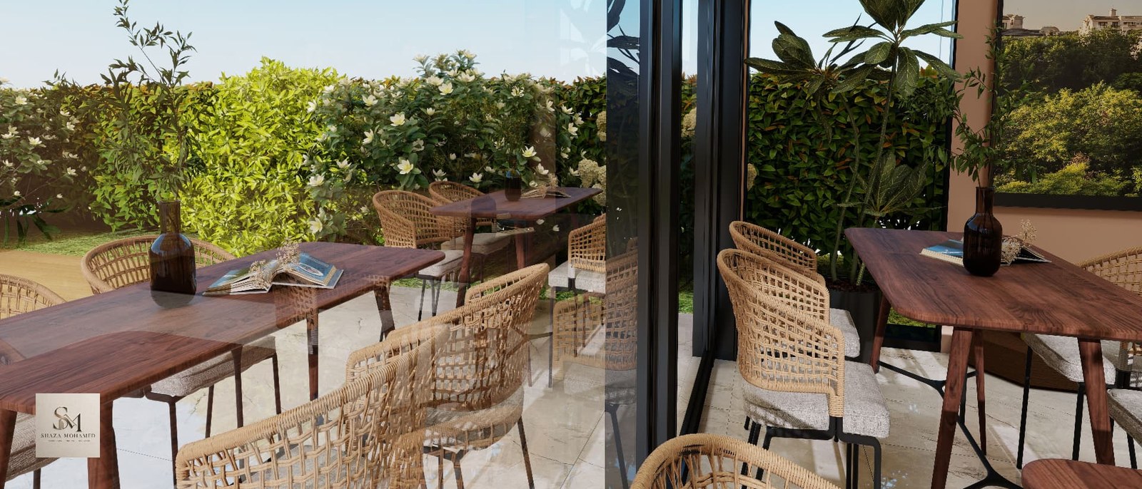 Interior com mesa em madeira escura e grande porta envidraçada de correr com montante preto, aberta para o terraço verde
